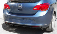 Opel Astra J 2009-2015 Heckdiffusor Aufsatz (grundiert zum Lackieren) Foto 1