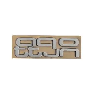 Quattro Grey Schriftzug Emblem Foto 2
