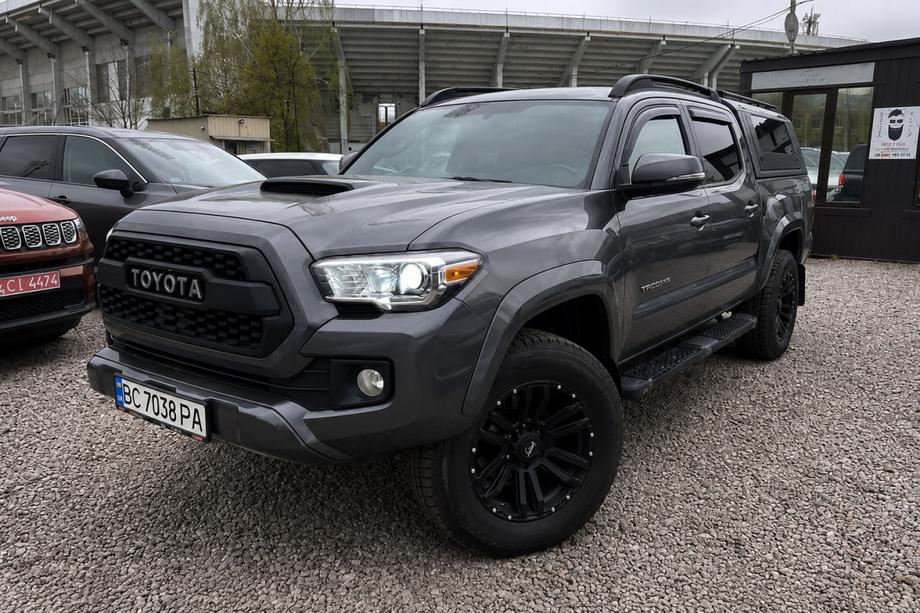Toyota Tacoma 2015–2023 OEM Dachreling schwarz (Aluminium) Foto 1
