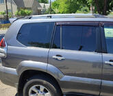 Toyota Land Cruiser Prado 120 2002-2009 Dachreling Chrom tuerkisch Kunststoff-Fuesse Foto 1