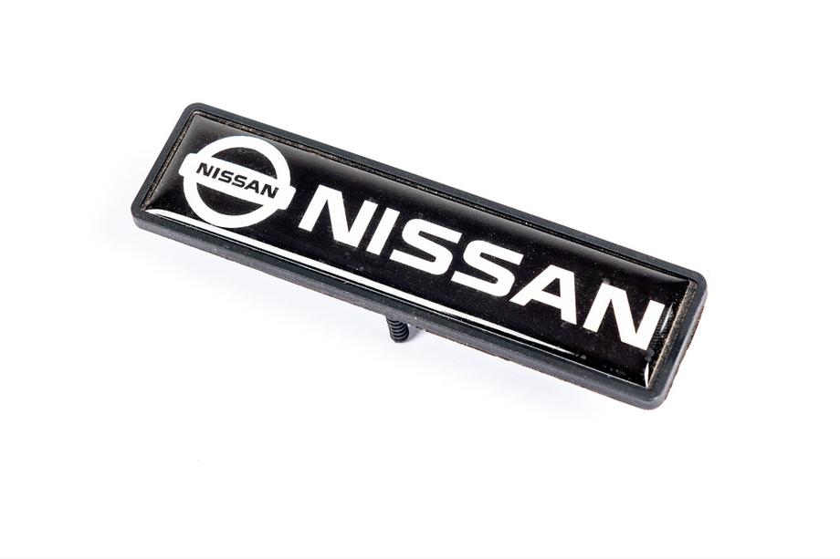 Nissan Emblem für Fußmatten (1 Stk) Foto 1